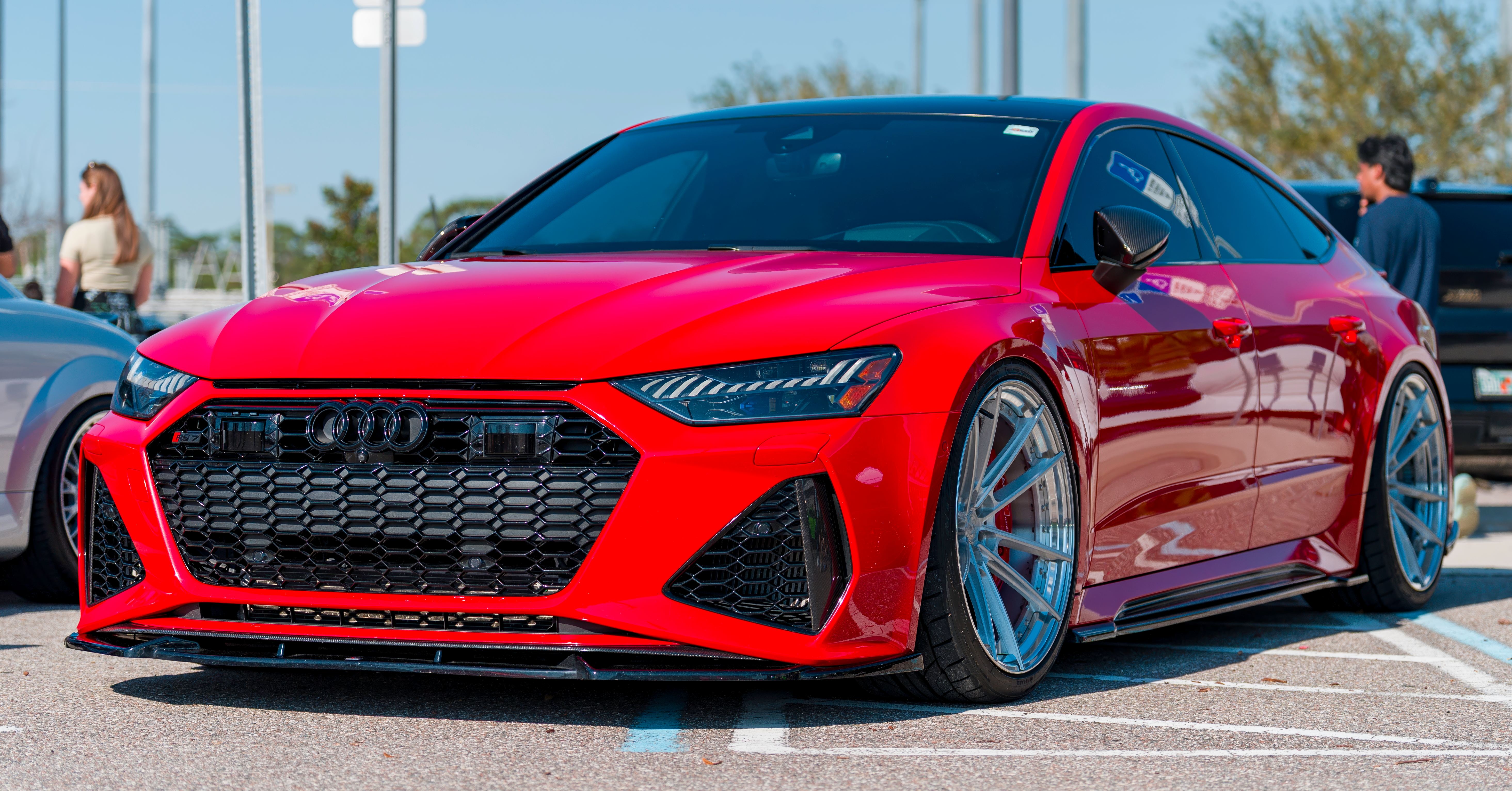 Red Audi RS7 photographed front three-quarter